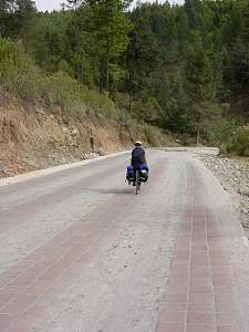 DSC02326 Nancy riding down from El Rosario.jpg